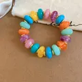 Bracelet en perles d'acrylique colorées avec séparateurs dorés, bijou fantaisie chic - Coloré