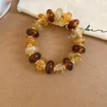 Bracelet en perles acryliques ambre style Maillard avec anneaux dorés pour femmes - Brun Café