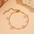 Macro view of dainty stainless steel bracelet with lovely pink and white bead flowers - Pink and White Flower Bracelet (D620)