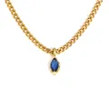 Dettaglio collana in acciaio inossidabile dorato con pendente in zircone blu - Blu scuro