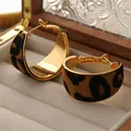 Elegant retro leopard print C-shaped hoop earrings featuring a polished gold-toned inner finish - Real Gold Plated Style (925 Sterling Silver Earring Post-Gold-Coffee-Real Gold Plated)