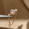 Detailopname van een gouden kettingring met een schitterende zirkonia-steen - 4# Roze Edelsteen Verstelbare Ketting Ring / Goud
