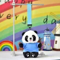Detail view of a cute panda plush charm wearing a blue shirt with a matching wrist strap - Lake Blue