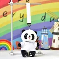 Close-up of a cute panda plush keychain wearing a white T-shirt with a hanging lanyard. - White