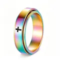 Macro view of iridescent stainless steel spinner ring with a black cross engraving. - Size 5 / Colorful