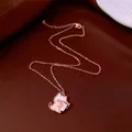 Detailed view of rose gold cat pendant necklace featuring elegant white shell inlay - Necklace-Rose Gold