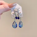 Elegant retro silver flower earrings featuring faceted blue teardrop-shaped crystals - Silver Post Gradient Teardrop (32#) / Blue