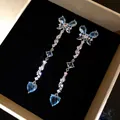 Elegant long blue butterfly and heart zircon dangle earrings displayed in a luxury box - Butterfly Heart Tassel / Silver Needle / 7# Silver Blue
