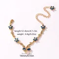 Bracelet élégant plaqué or orné de fleurs en zircon bleu et d'un motif nœud délicat. - Style Vertical-Or-Zirconia Bleu Royal