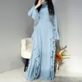 Robe longue bleu clair élégante à manches longues avec volants et poignets évasés. - S / Bleu