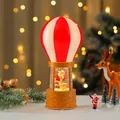 Festive Christmas hot air balloon snow globe night light with Santa Claus figure. - Hot Air Balloon Santa with Bell (11*11*25cm 750g)