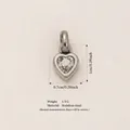 Silver heart-shaped stainless steel pendant with clear zircon stone, variant view. - April Heart Birthstone Pendant (Steel Tone) Only (Without Chain) / Steel