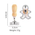 Gingerbread man shaped zinc alloy cookie cutter with ergonomic wooden handle for baking - Gingerbread Man