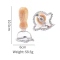 Stainless steel bell-shaped cookie cutter with ergonomic wooden handle for baking - Ghost