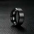 Macro detail view of black brushed titanium steel ring for men on leather background - Black / Size 7