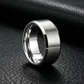 Macro view of silver brushed titanium steel ring with a wide band on black leather texture. - Size 7 / Plain Flat Style / Silver