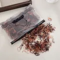 Disposable mini hair elastics for kids in brown and nude shades with frosted bag - Approx. 1000Pcs/Bag / Brown