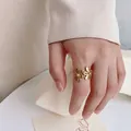 Elegant golden double flower open ring made of durable titanium steel for women fashion - US 6 / Gold