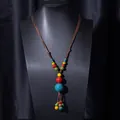 Handcrafted ethnic ceramic bead necklace with colorful pendant and brown woven cord - X470-8 Round Mixed Color