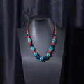 Handmade Jingdezhen ceramic bead necklace with blue and red tones on braided cord - X470-15 Light Blue Octagon