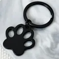 Minimalist black stainless steel paw print keychain for pet tags and personalized DIY pendants. - Black Claw Marks