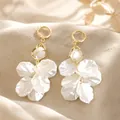 Elegant white floral petal drop earrings featuring gold hoops and pearl accents in Korean style - Irregular Multi-layer White Petal Tassel Style (E7390)