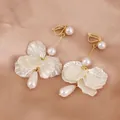 Elegant white petal drop earrings with pearls and gold-tone accents for stylish women - Triangle Clip-on Petal Style (E6235-5/Gold)