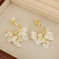 Elegant Korean style white floral petal dangle earrings with gold finish and small rhinestones - Gold Spiral Plate Clip-on Petal Style (E6018/Gold)