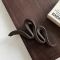 Matte dark brown large wavy hair claw clip for thick hair displayed on wooden surface - Lightning Style / 13cm / Matte Dark Coffee
