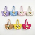 Hand-woven cotton rope basket handbags in multiple vibrant colors with floral charm - Woven Green Leaf Flower Ball Style / Pink