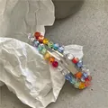 Barrette à cheveux argentée tendance avec perles de cristal arc-en-ciel pour la frange - Goutte d'eau multicolore (7cm)