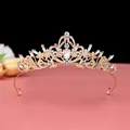 Detailed view of a rose gold Baroque bridal crown with shimmering clear crystals. - No.1 KC Gold Small (White Stone)