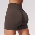 High-waisted seamless yoga shorts in brown with athletic scrunch butt detail for women - Dark Brown