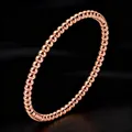 Elegant rose gold beaded stainless steel bangle with a high polished mirror finish - Rose Gold Round Bead