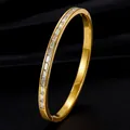 Elegant gold stainless steel bangle bracelet set with sparkling baguette-cut stones - Gold Color Baguette Cut Style (44-E-3)