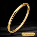4mm gold-plated titanium steel bangle featuring a polished curved surface for women - 4mm Domed-Gold