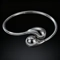 Minimalist titanium steel open cuff bracelet with polished teardrop ends in silver - Steel Color Water Drop