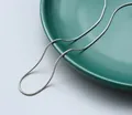 High-quality stainless steel snake chain necklace in a smooth silver finish variant. - Round Snake Chain 0.9x40+5cm with Tail Piece (Steel Color)