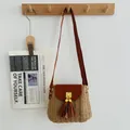 Bohemian retro woven straw crossbody bag featuring brown leather flap and tassels - Bell Coffee