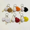 Detailed view of mini baseball keychains with colorful leather gloves and wooden bats. - 3.5CM White Ball Mixed Colors
