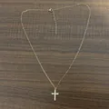 Exquisite 18K gold plated stainless steel necklace featuring a micro-paved CZ cross pendant - Gold