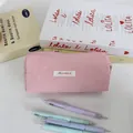 Minimalist Macaron pink pencil case shown with pastel pens on book background. - 19x6x7cm / Pink