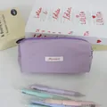 Close-up of a minimalist purple pastel pencil case with a Mayrabbit white label tag. - 19x6x7cm / Purple