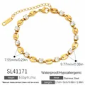 Bracciale in acciaio inossidabile dorato con zirconi trasparenti e maglie ovali - Placcato Oro 18K / Stile a Maglia a Chicco di Caffè con Strass (SL41171)