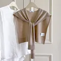 Elegant beige wool blend knit shawl for women's office layering and fashion styling - Camel
