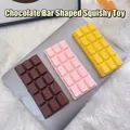 Antistress Schokoladenriegel Squishy Spielzeug in Rosa, Gelb und Braun - PU-Schokoladenriegel