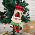 Festive Christmas stocking featuring a 3D cartoon elf doll and red black plaid trims - Christmas Elf Buffalo Plaid