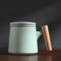Elegant mint green matte ceramic mug featuring a natural wooden handle and matching lid - Single Cup / Light Green