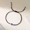 Minimalistisches handgewebtes Evil Eye Armband mit einer verstellbaren schwarzen Schnur - Schwarzes Seil