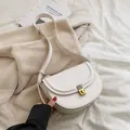 Elegante borsa a tracolla a sella retrò in pelle bianco crema con fibbia dorata - Bianco Sporco